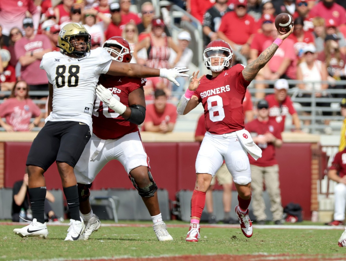 Oklahoma's Dillon Gabriel (8) throws a pass in the second half of the college football game between the University of Oklahoma Sooners and the University of Central Florida Knights at Gaylord Family Oklahoma-Memorial Stadium in Norman, Okla., Saturday, Oct., 21, 2023.